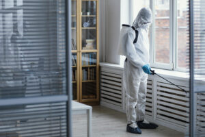 people-disinfecting-biohazard-area.jpg